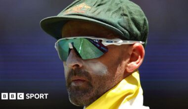 Nathan Lyon looks on