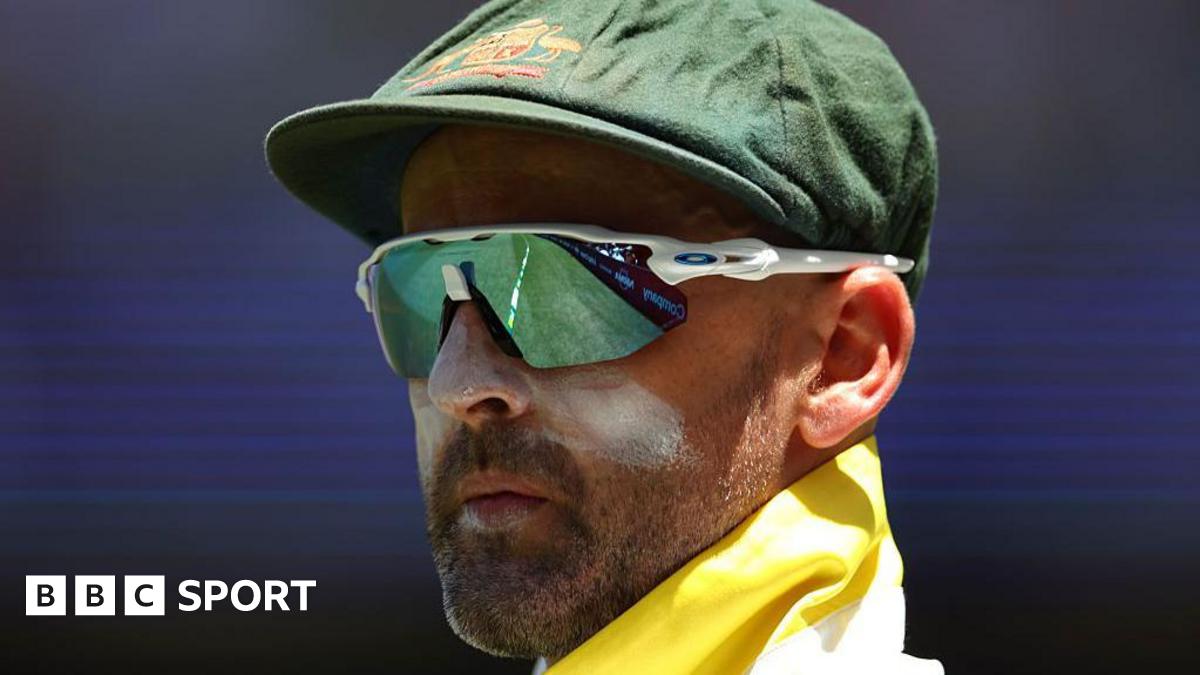 Nathan Lyon looks on