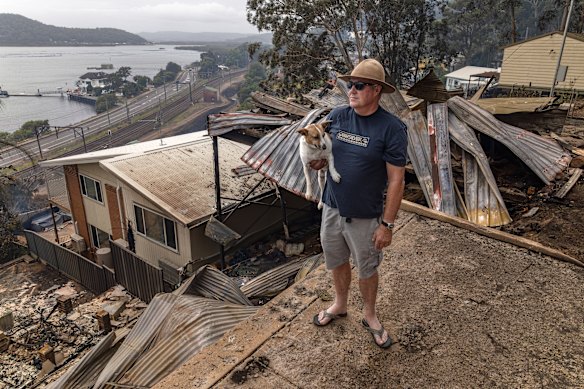 Steve Foskett and his dog Cali, who “didn’t do any helping” while they defended his home.