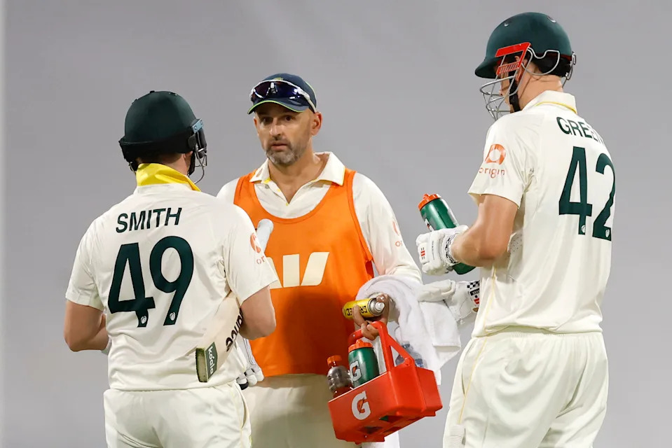 Australia spinner Nathan Lyon is seen here bringing drinks out for Steve Smith and Cameron Green during the second Ashes Test.