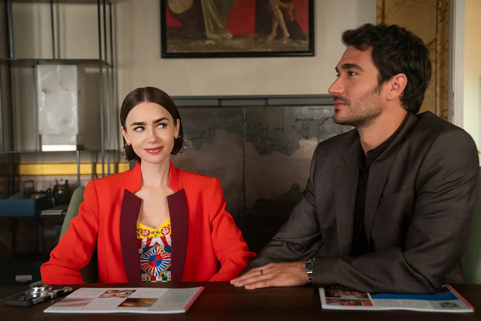 Lily Collins as Emily and Eugenio Franceschini as Marcello in Emily in Paris.(Caroline Dubois/Netflix)