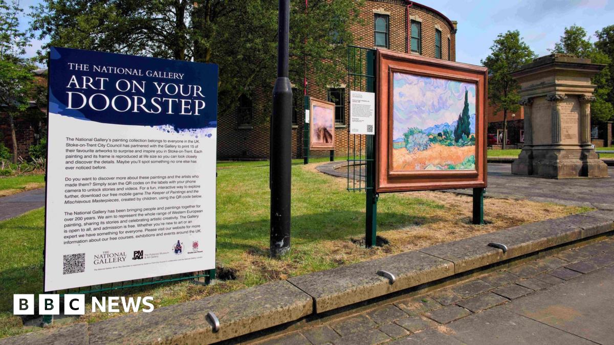 An interpretation board next to a replica artwork. The board has a dark blue top with white writing that reads The National Gallery Art on Your Doorstep. The artwork and board have been installed on a patch of lawn