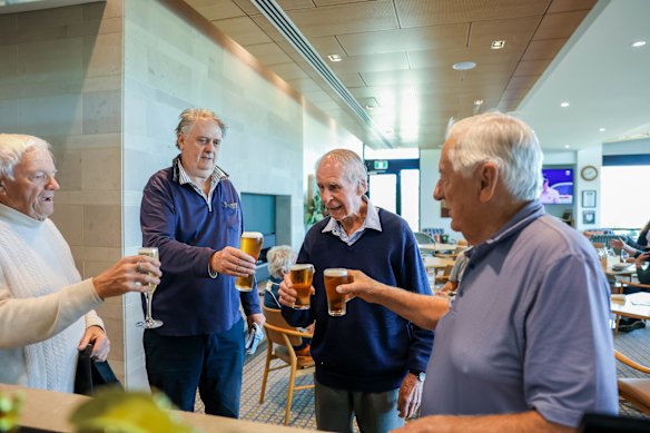 Cheers: Bill Horn, second from right with mates, from left, Walter De Laps, Peter Neville-Jones, and Brian Mollet (far right) at Portsea Golf Club’s bar after playing nine holes.
