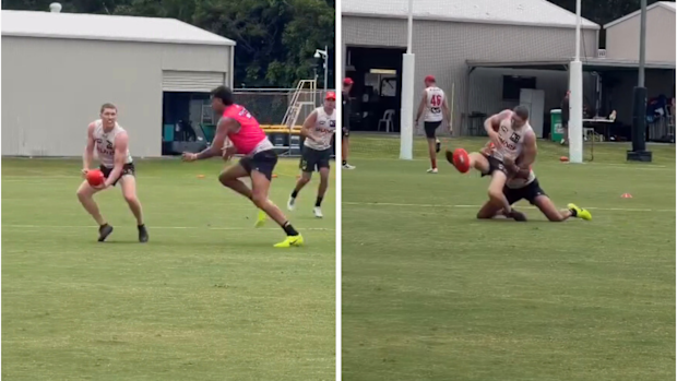 Ugle-Hagan chases down Rowell at training.