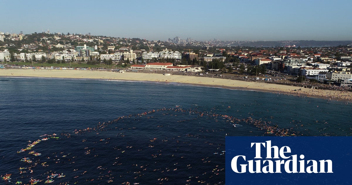 Bondi paddle-out: surfers, paddleboarders and swimmers pay tribute to victims of mass shooting | Bondi beach terror attack