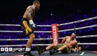 Troy Williamson knocks Callum Simpson down