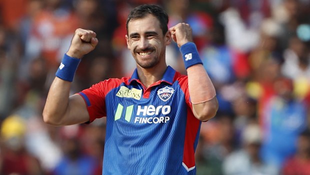 Delhi Capitals' Mitchell Starc celebrates the wicket of Sunrisers Hyderabad's Ishan Kishan during the Indian Premier League cricket match between Delhi Capitals and Sunrisers Hyderabad at ACAVDCA Cricket Stadium in Visakhapatnam, India, Sunday, March 30, 2025. (AP Photo/Surjeet Yadav)