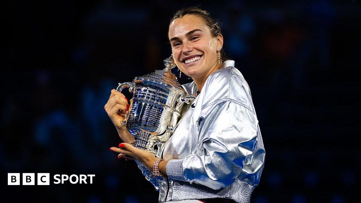 Aryna Sabalenka poses with the US Open trophy