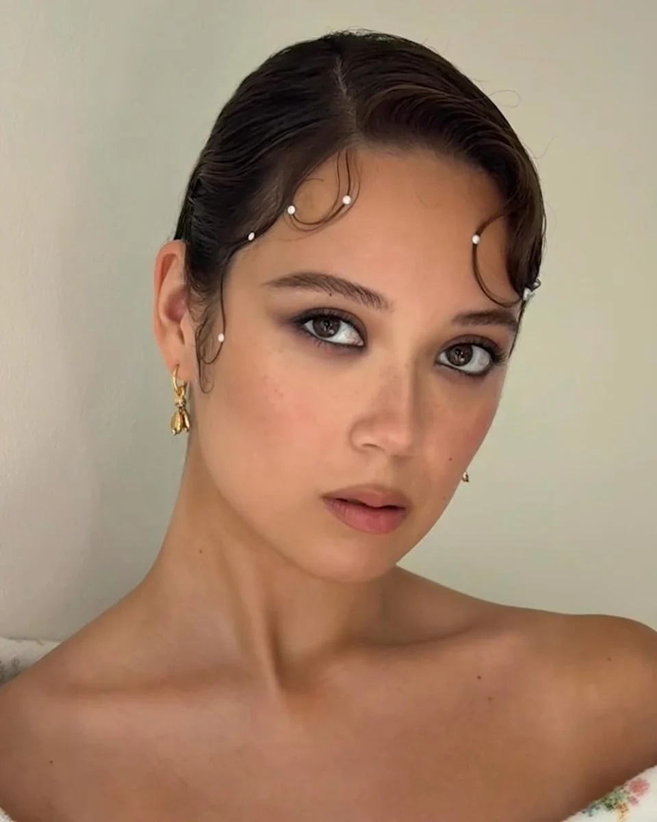 portrait featuring a person wearing earrings