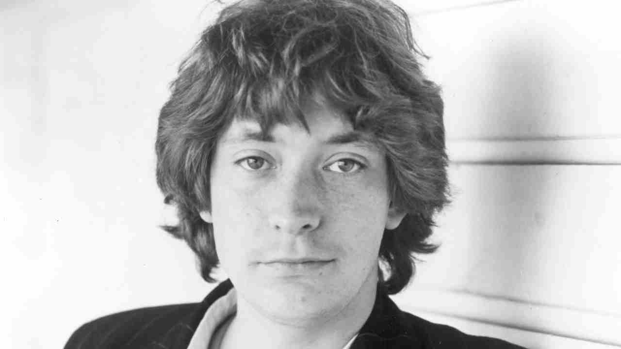 Chris Rea posing for a photograph in the 1970s