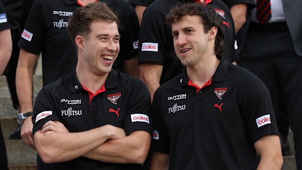 Zach Merrett and Andrew McGrath of the Bombers.