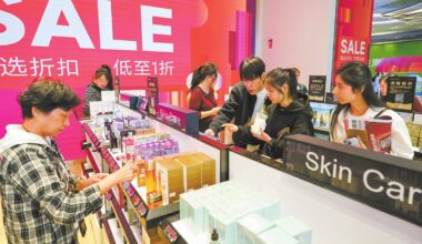 Customers shop at the Haikou International Duty Free City in Haikou, South China