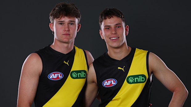 Sam Cumming and Samuel Grlj pose after being selected by the Tigers as part of the 2025 AFL Draft.