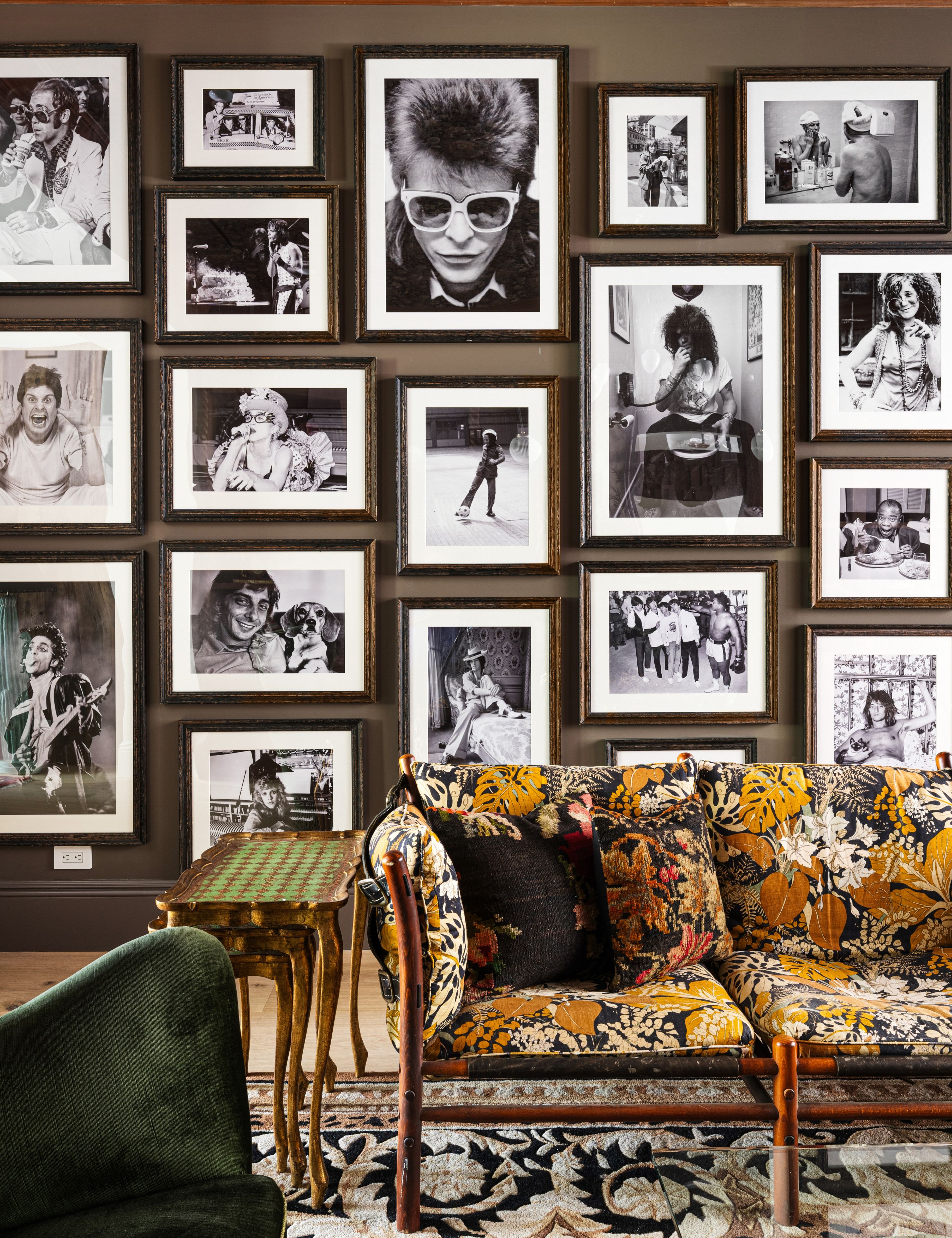 Parlor room gallery wall featuring oversized black-and-white framed photographs