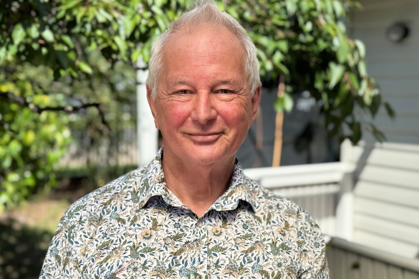 A man in a floral shirt