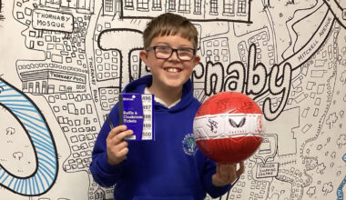 Young football fan's festive homeless fundraiser