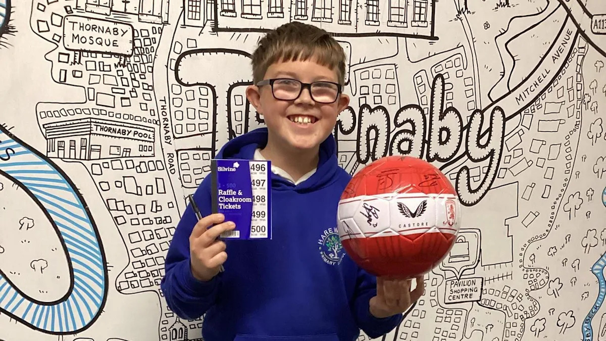 Young football fan's festive homeless fundraiser
