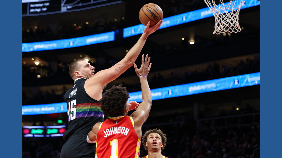 Jokic scores 39 points as Nuggets use big fourth quarter to rally for 134-133 win over Hawks