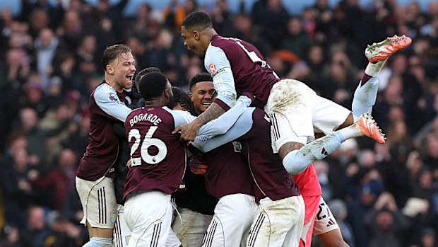 Aston Villa players celebrates a victory.