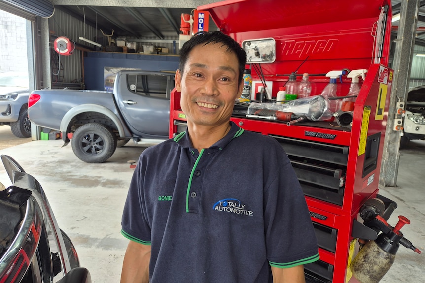 A man working in a mechanic shop