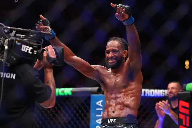 PERTH, AUSTRALIA - SEPTEMBER 28: Neil Magny of the United States celebrates after winning his fight against Jake Matthews of Australia in the Welterweight Bout during the UFC Fight Night at RAC Arena on September 28, 2025 in Perth, Australia. (Photo by Paul Kane/Getty Images)