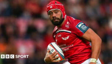 Josh Macleod of Scarlets runs with the ball