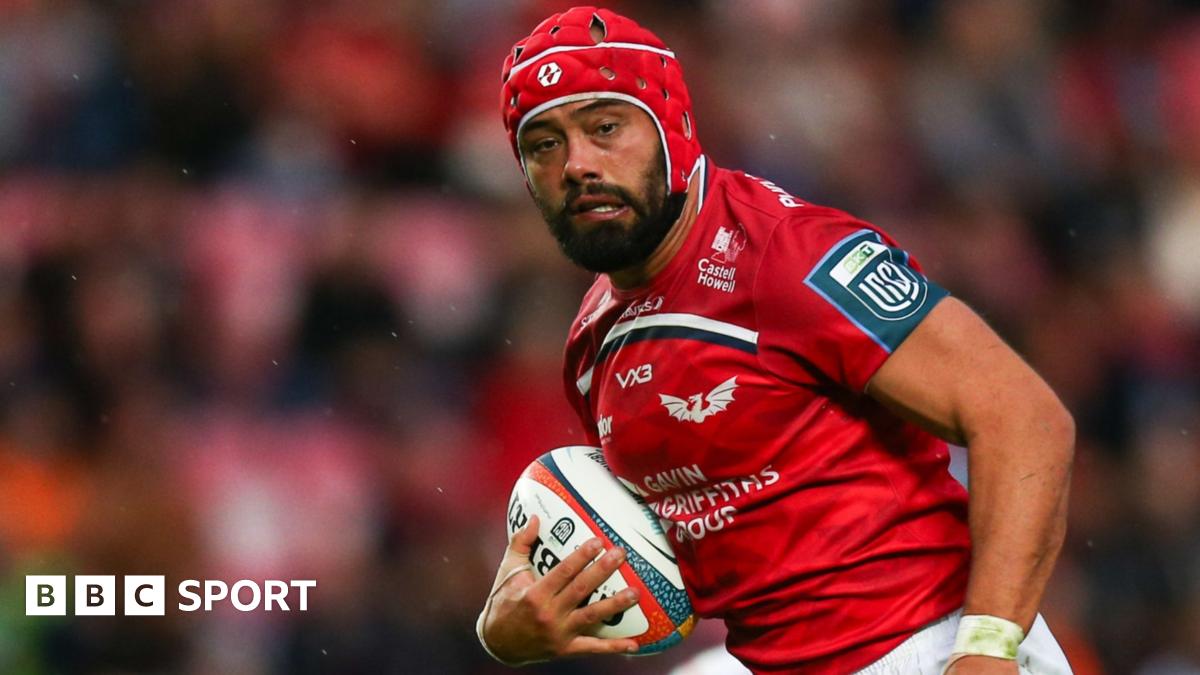 Josh Macleod of Scarlets runs with the ball