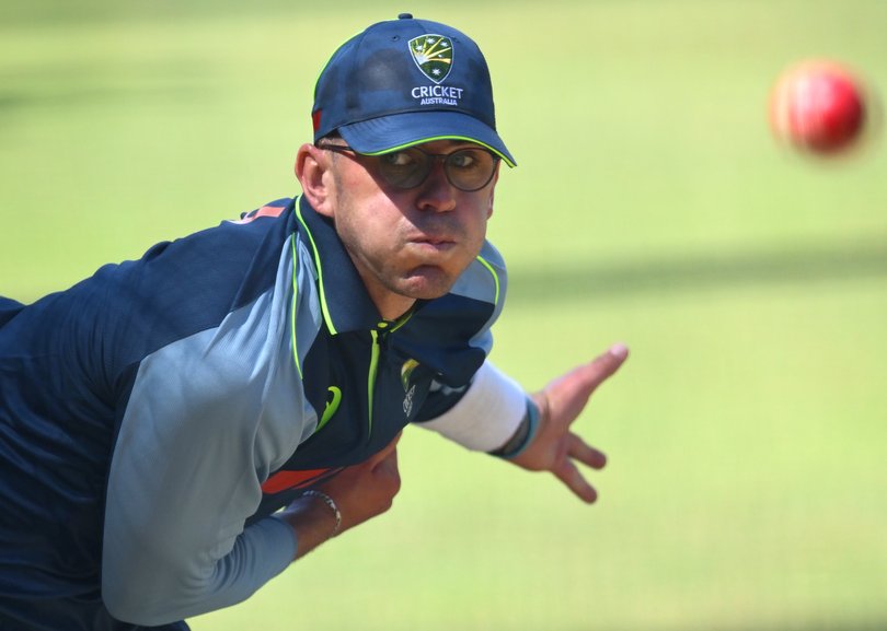 Todd Murphy of Australia bowls in the nets.