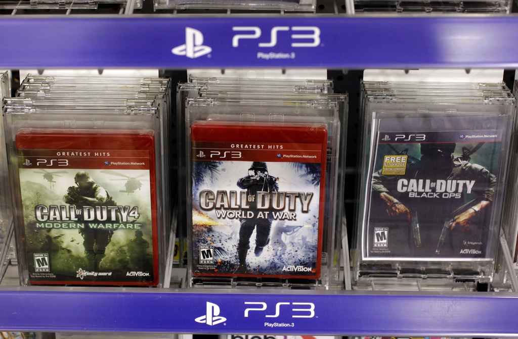 Three versions of Activision's Call Of Duty games are seen on sale at Best Buy in Mountain View, Calif., Wednesday, Aug. 3, 2011. Vincent Zampella, one of the creators behind such best-selling video games "Call of Duty," has died at 55. (AP File Photo/Paul Sakuma)