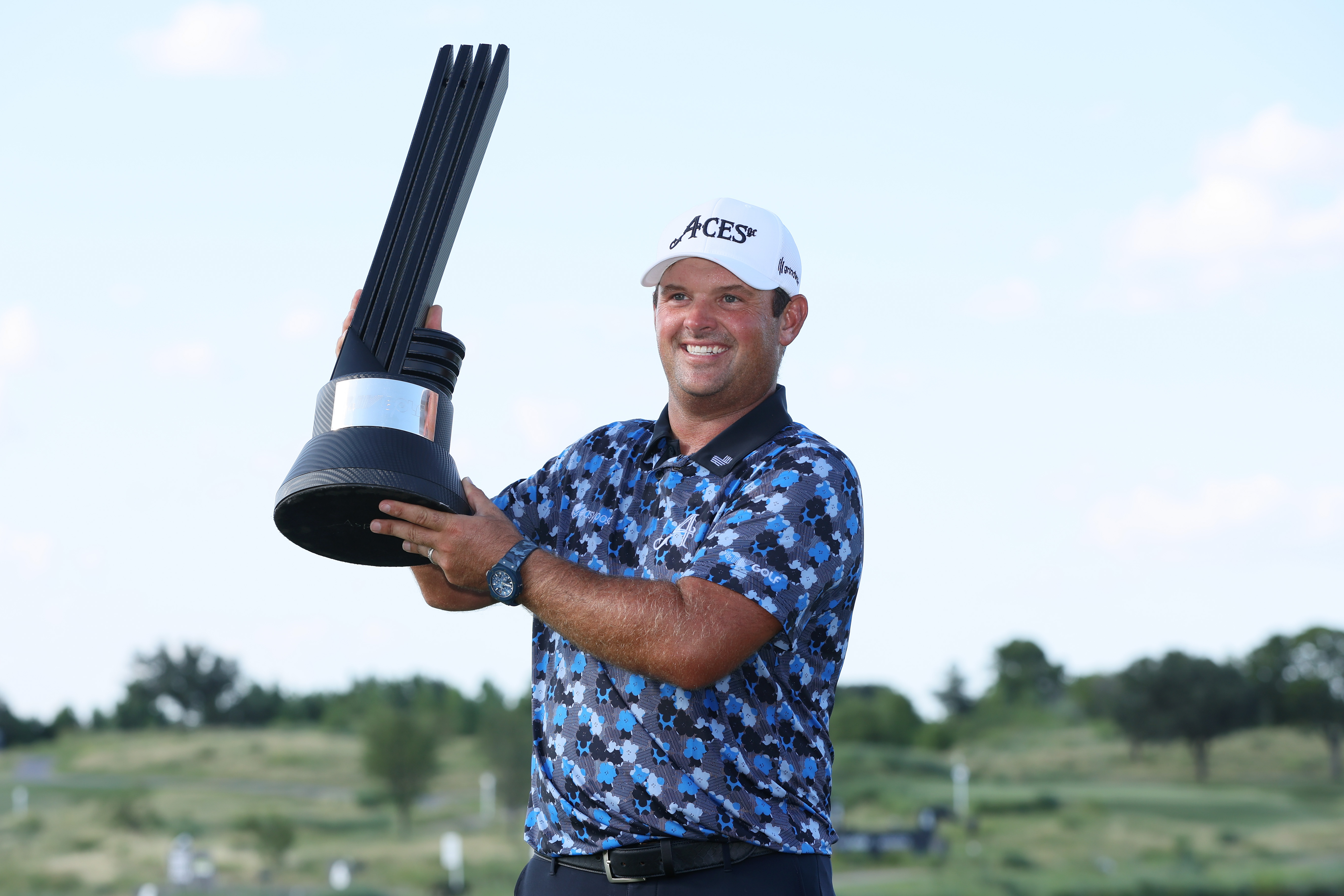 Patrick Reed holds the LIV Golf Dallas trophy