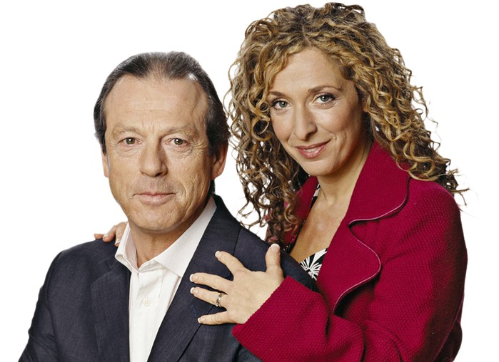 Leslie Grantham as Den Watts and Tracy-Ann Oberman as Chrissie Watts pose in smart jackets and smile for a promo image for EastEnders in 2004.