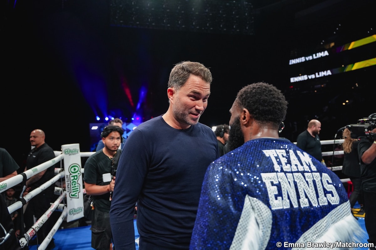 Jaron “Boots” Ennis speaks with promoter Eddie Hearn inside the ring after scoring a first-round knockout of Uisma Lima at the Wells Fargo Center in Philadelphia on October 11, 2025.