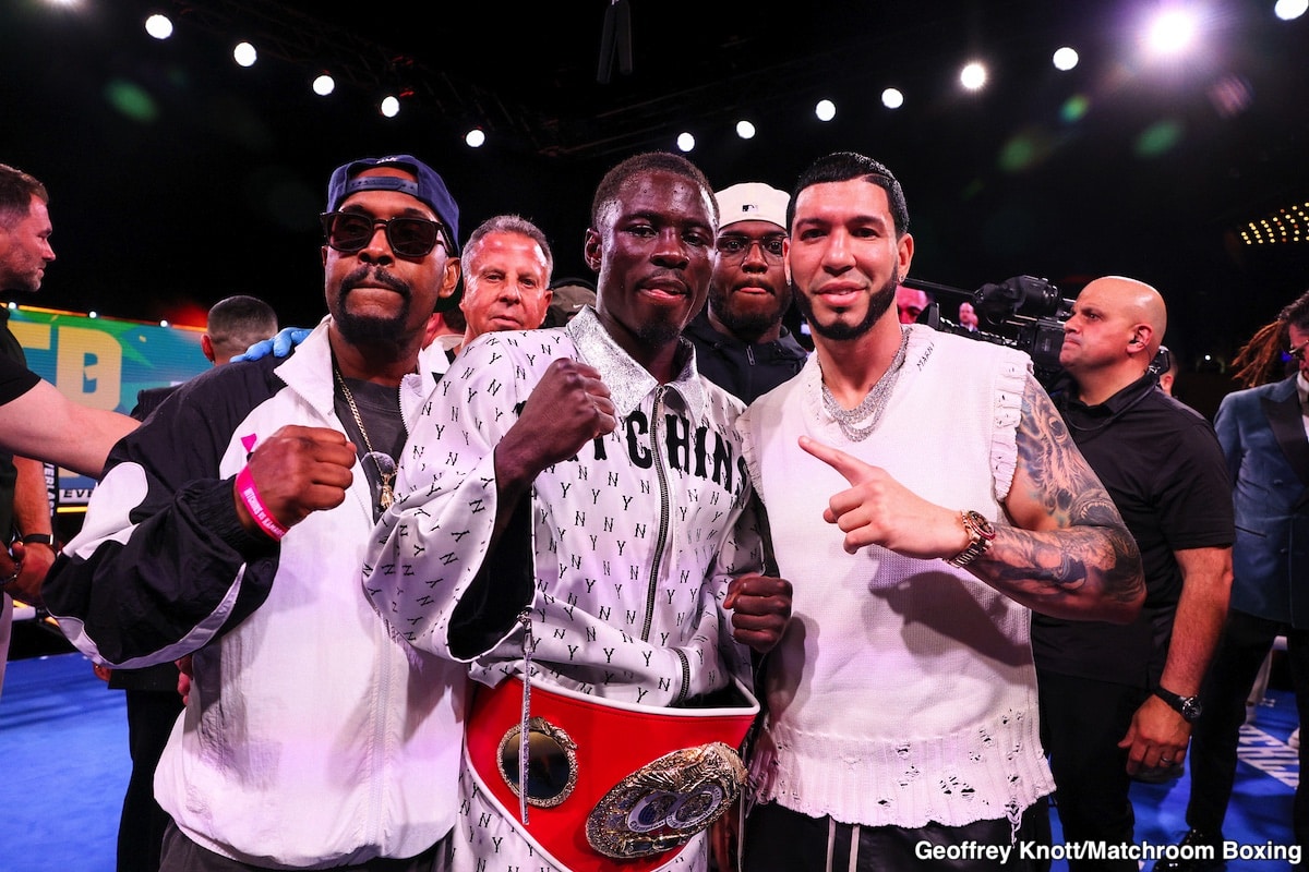 Richardson Hitchins poses with his championship belt alongside his team after defeating George Kambosos Jr. on June 14, 2025, at Madison Square Garden in New York City.