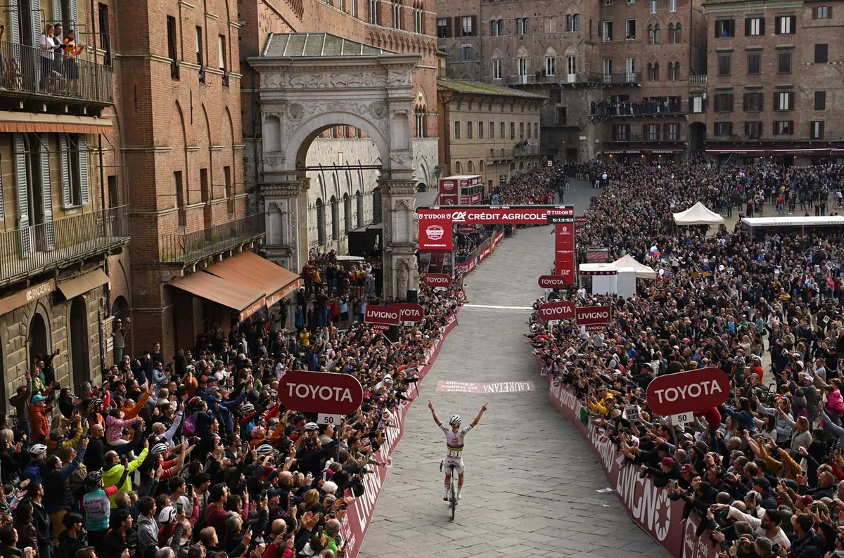 Tadej Pogacar of Slovenia and UAE Team Emirates-XRG celebrates at finish line as race winner competes during the 19th Strade Bianche 2025.