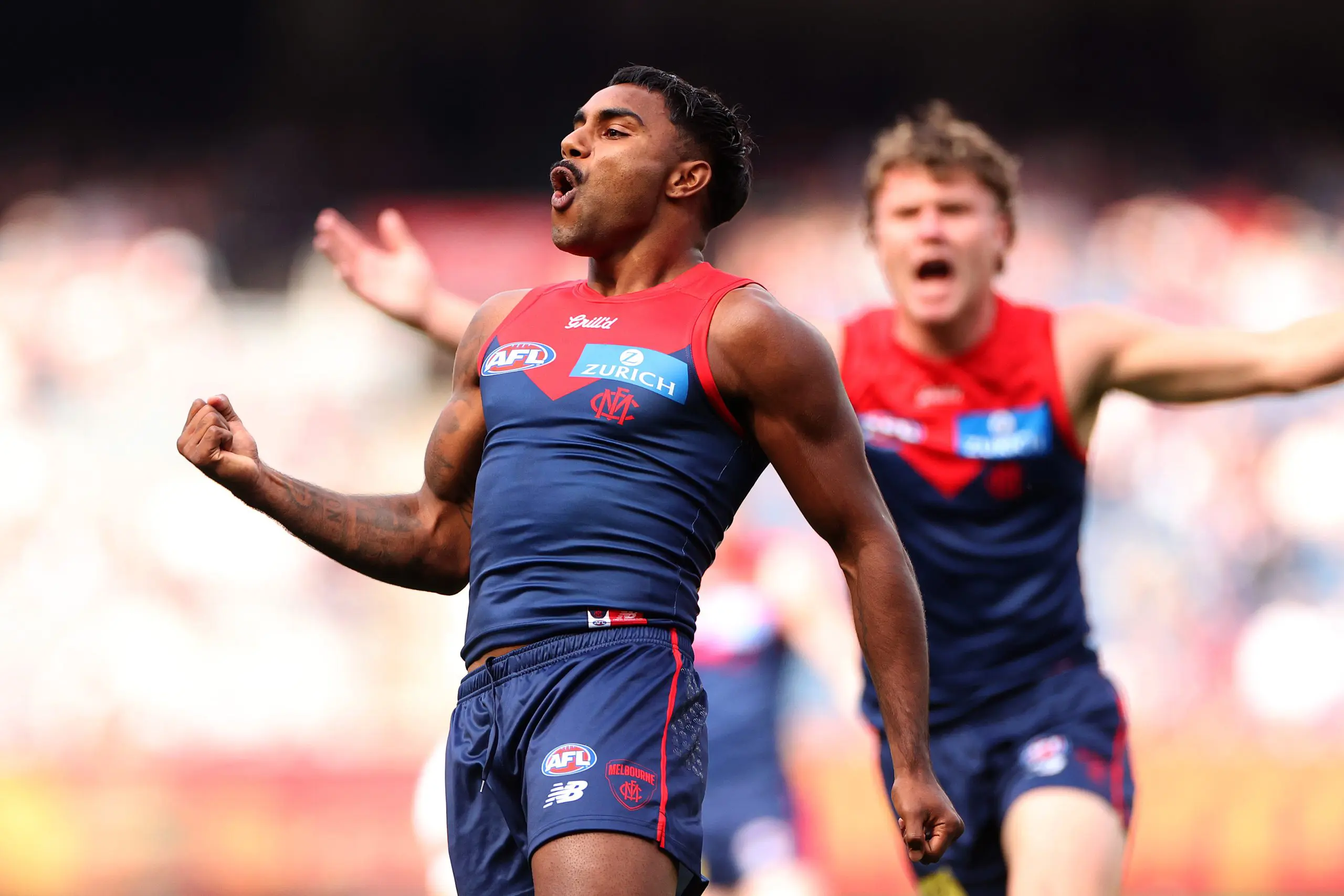 MELBOURNE, AUSTRALIA - APRIL 19: Kysaiah Pickett of the Demons celebrates kicking a goal during the round six AFL match between Melbourne Demons and Fremantle Dockers at Melbourne Cricket Ground, on April 19, 2025, in Melbourne, Australia. (Photo by Kelly Defina/Getty Images)