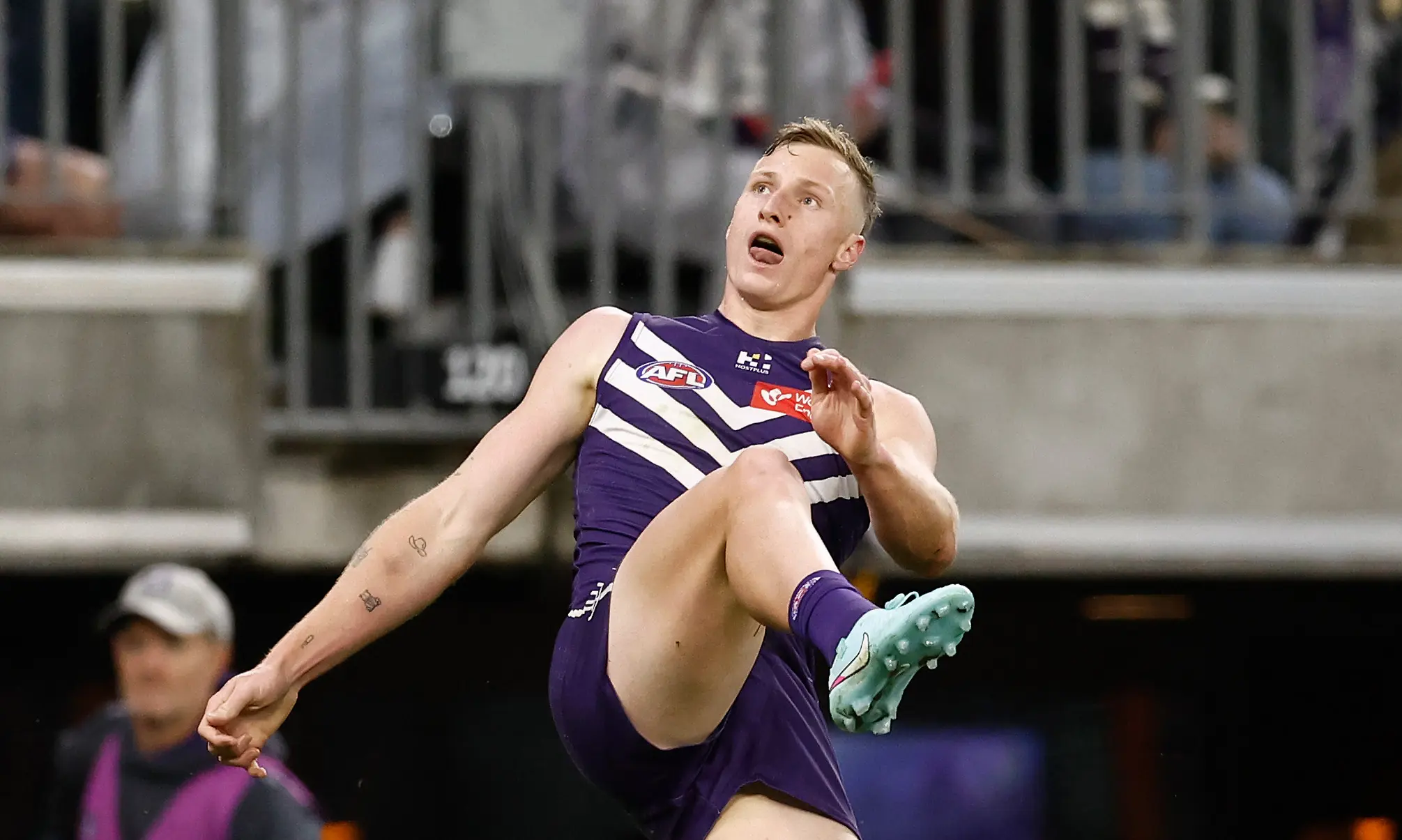 PERTH, AUSTRALIA - SEPTEMBER 06: Josh Treacy of the Dockers kicks the ball during the AFL Second Elimination Final match between the Fremantle Dockers and the Gold Coast Suns at Optus Stadium on September 06, 2025 in Perth, Australia. (Photo by Michael Willson/AFL Photos via Getty Images)