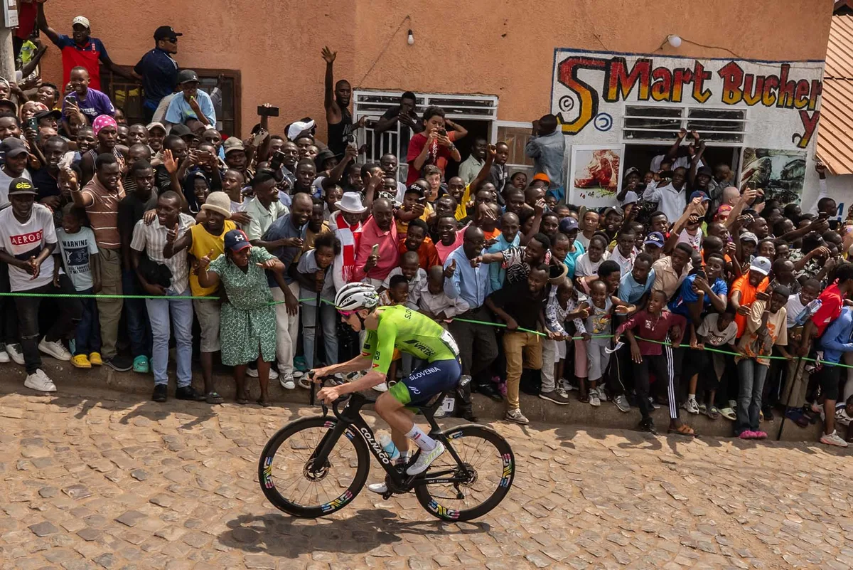 Tadej Pogacar and Team Slovenia climbs the steep cobblestone Mur de Kigali (Wall of Kigali) in the breakaway during the 98th UCI Cycling World Championships Kigali 2025.