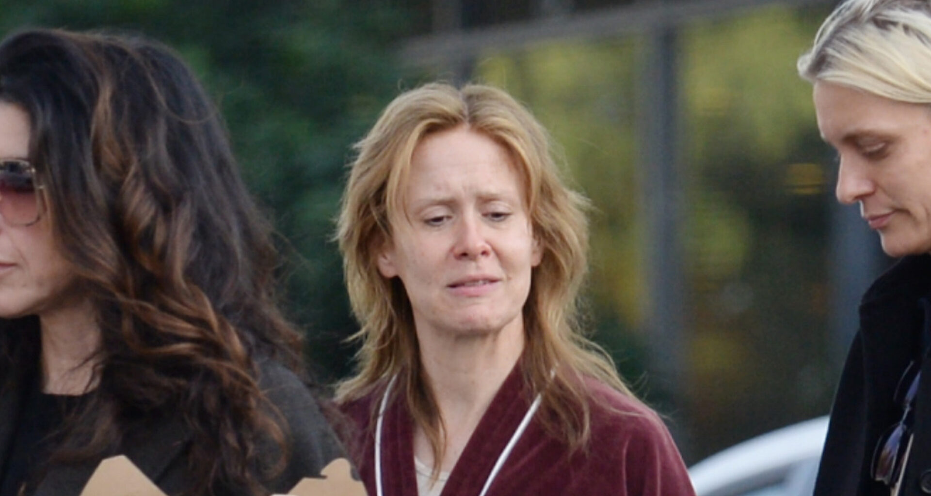 A-list actress looks totally unrecognizable as she films new role in robe and slippers