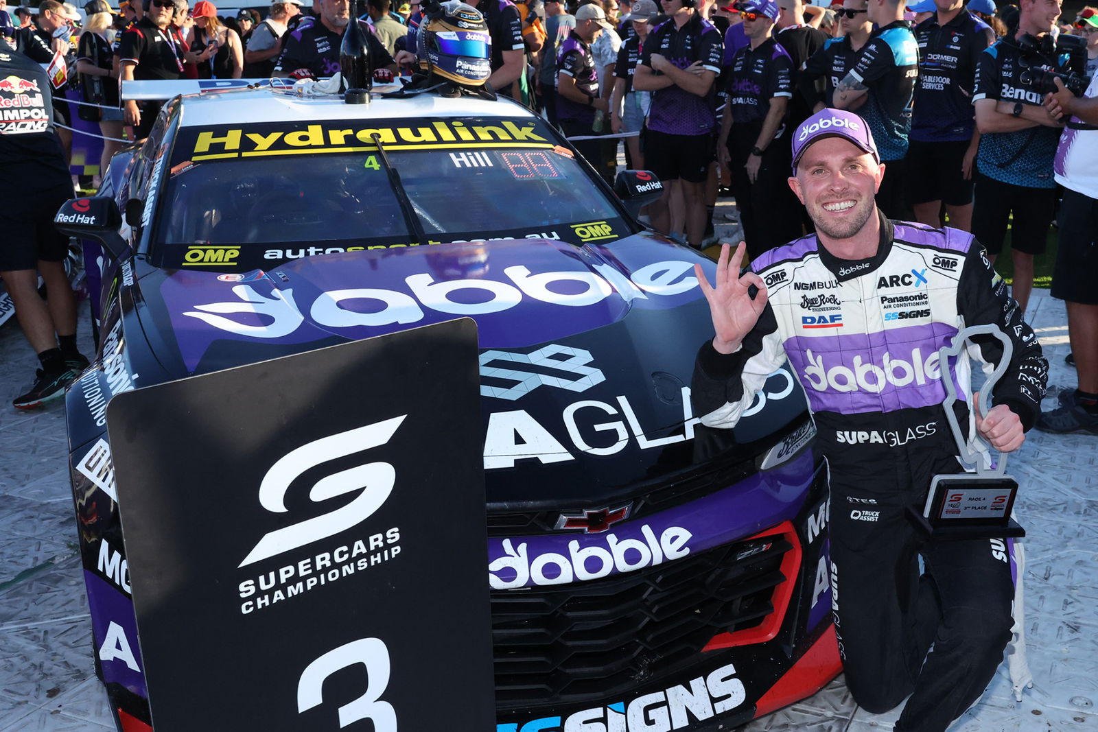 Cameron Hill celebrates finishing third in Race 4 of the 2025 Repco Supercars Championship at the Formula 1 Australian Grand Prix.