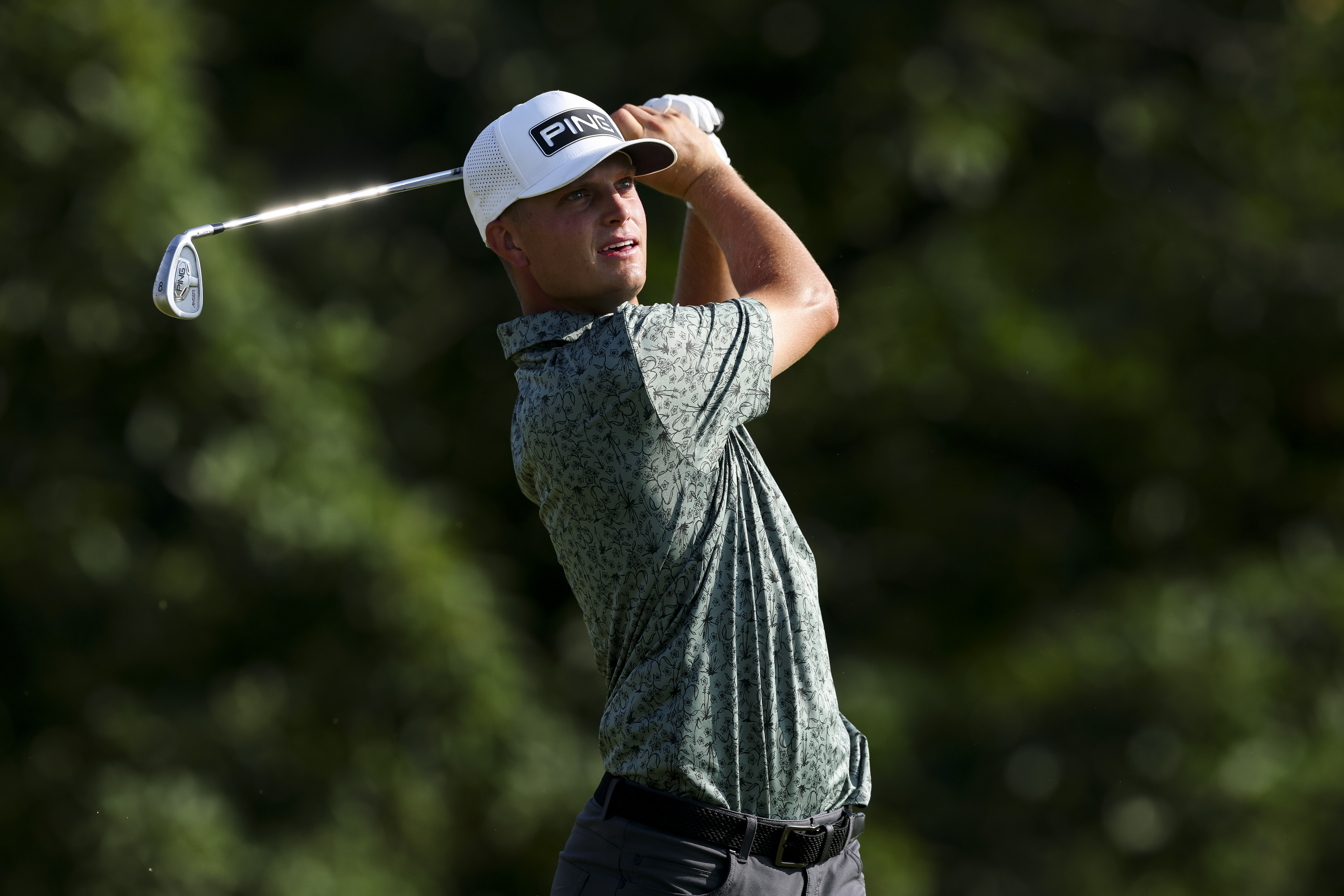 William Mouw hits an iron shot