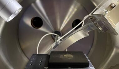 Some of the Apollo sample in a test chamber for a tunneling elecron microscope. Credit - Southwest Research Institute