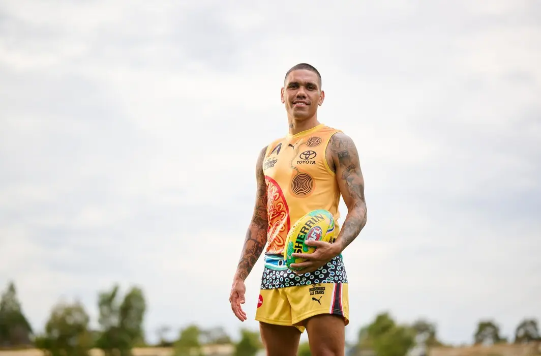 Michael Walters poses for a photo in the 2025 Indigenous All-Stars playing guernsey. Picture: AFL Photos
