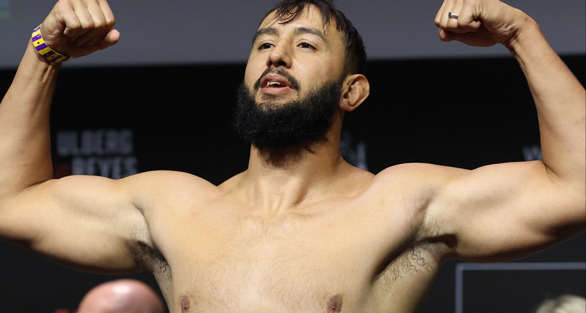 Dominick Reyes poses on the scale during the UFC Perth ceremonial weigh-in