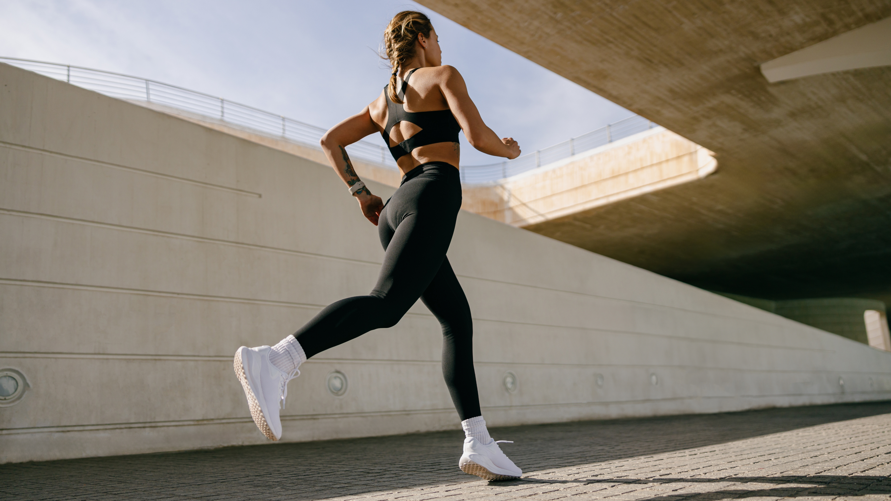 the back of a woman running