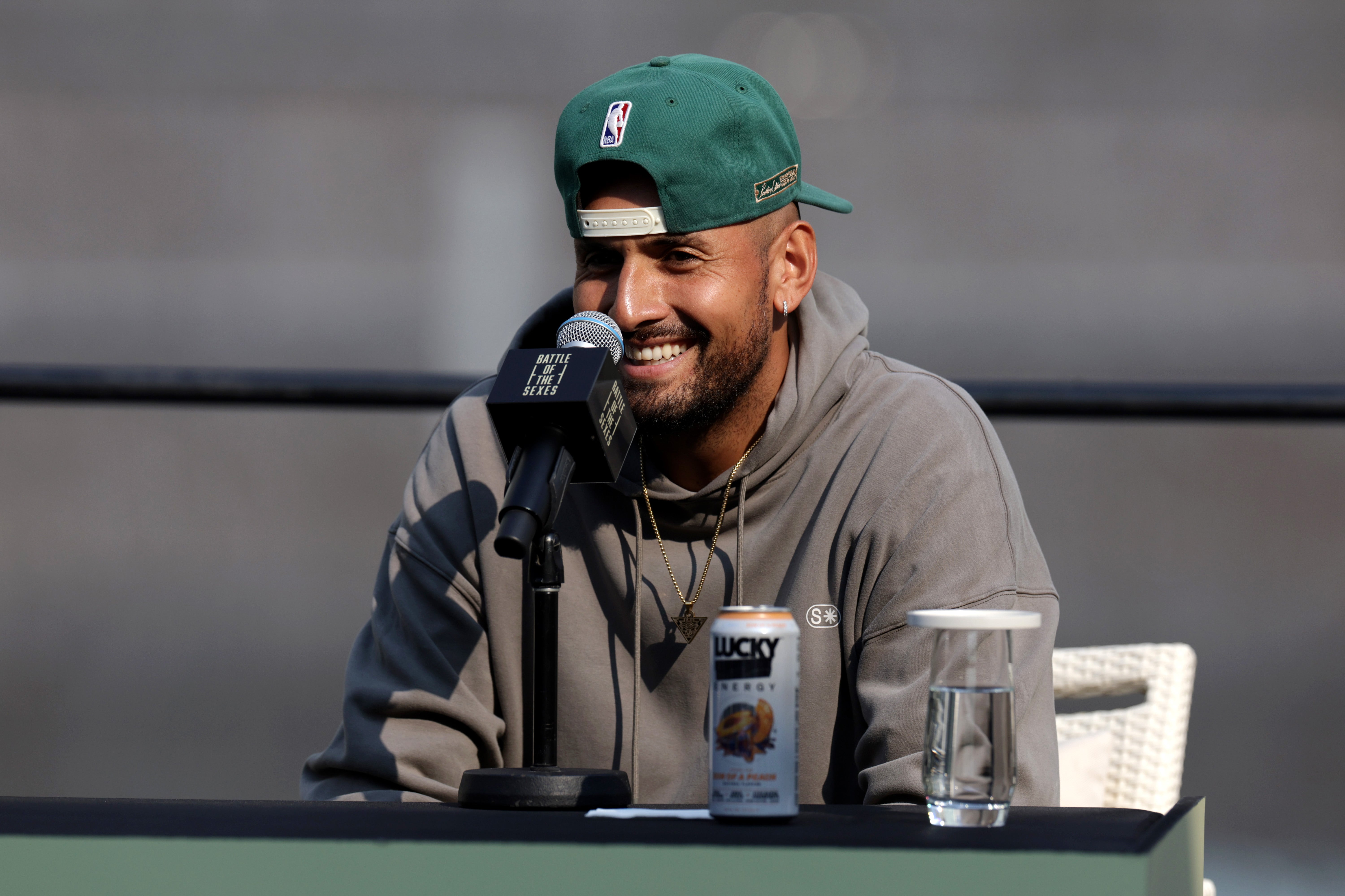 Nick Kyrgios of Australia reacts during a press conference