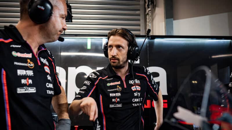 Pasquale Valente in Aprilia MotoGP pit garage
