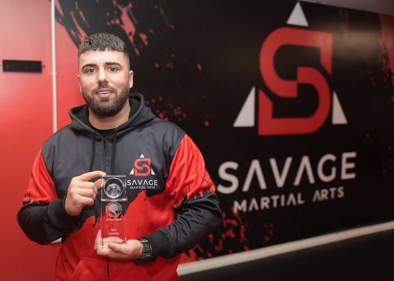 Jordan Smith with his 2025 Global Recognition Award at Savage Martial Arts Gym, North Belfast. PICTURE:BRIAN LINCOLN