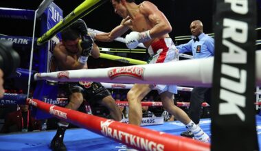 Rafael Espinoza throws a right hand at Edward Vazquez along the ropes during their featherweight bout at T-Mobile Arena in Las Vegas.