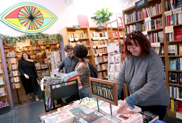 Co-owner Christin Evans works at The Booksmith on Haight Street in San Francisco, Calif., on Wednesday, Dec. 24, 2025. Evans provides four of her employees with 100% free health insurance. (Jane Tyska/Bay Area News Group)