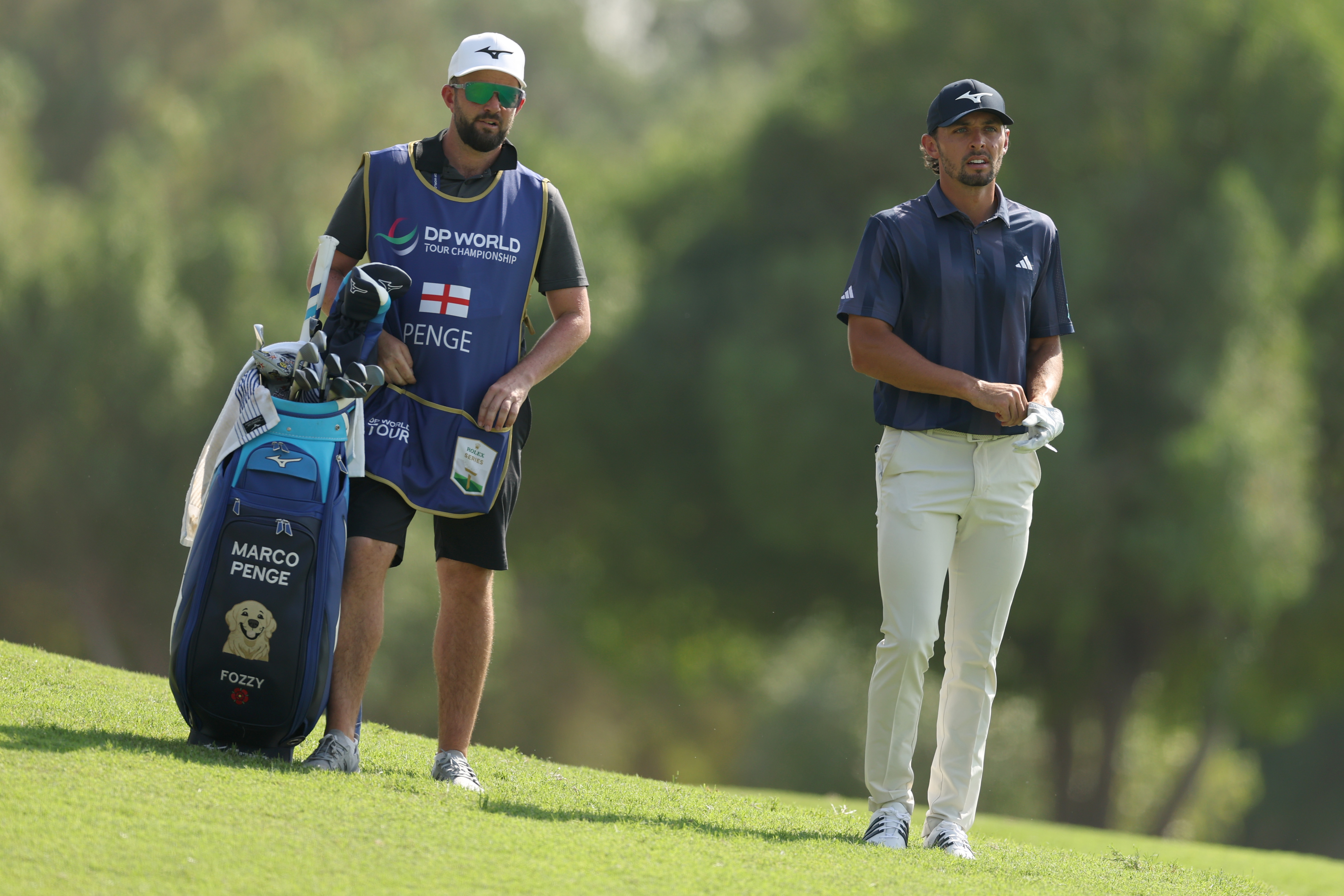 Marco Penge and his caddie chat